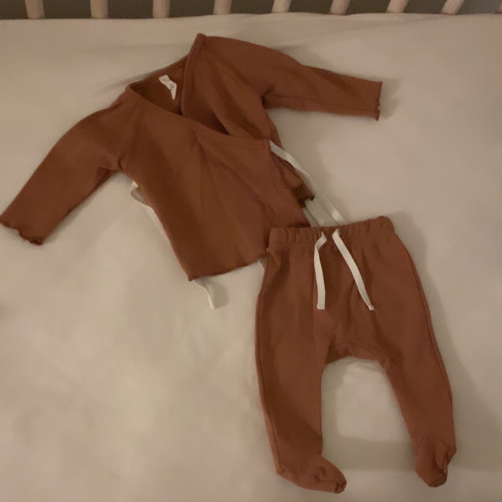 Like new condition. Washed once free & clear hung dry. Never worn. Newborn must!